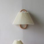 Beech Folding Half-Circle Wall Lamp in a styled room setting - Vivotee
