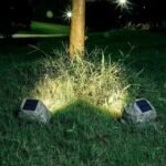 Solar Stone-Effect Garden Light, IP65 in a styled room setting - Vivotee